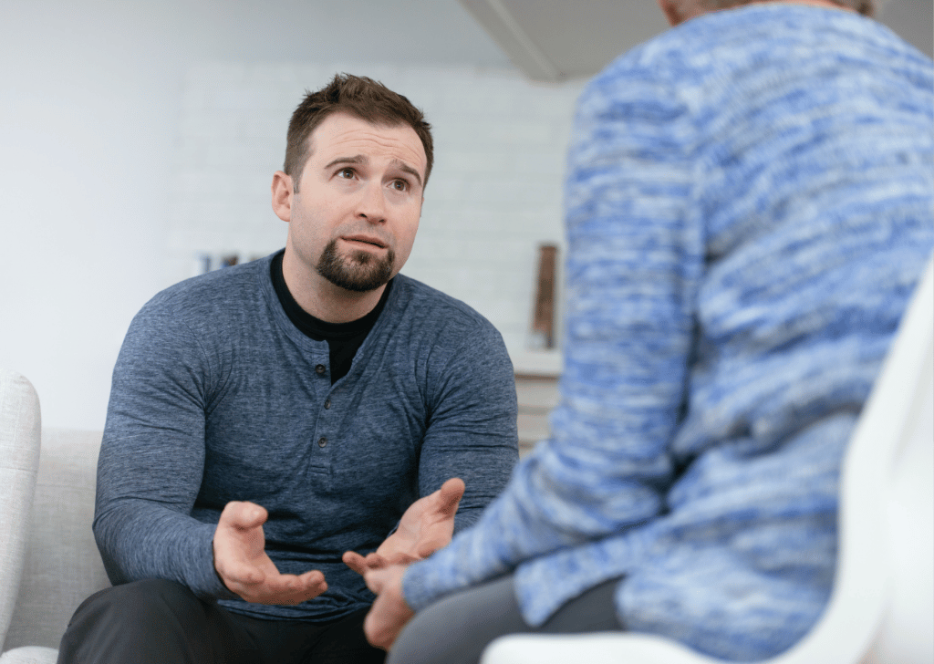 Upset man in therapy