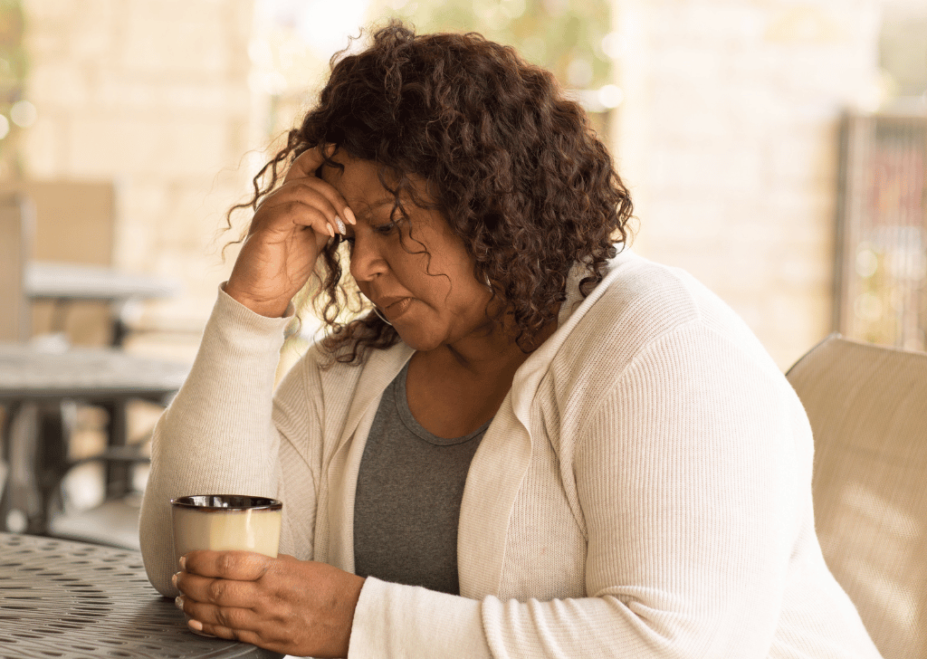 African American middle age woman looking sad.
